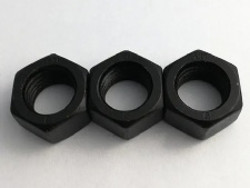 Nuts of high strength steel construction